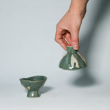 Pinched cups